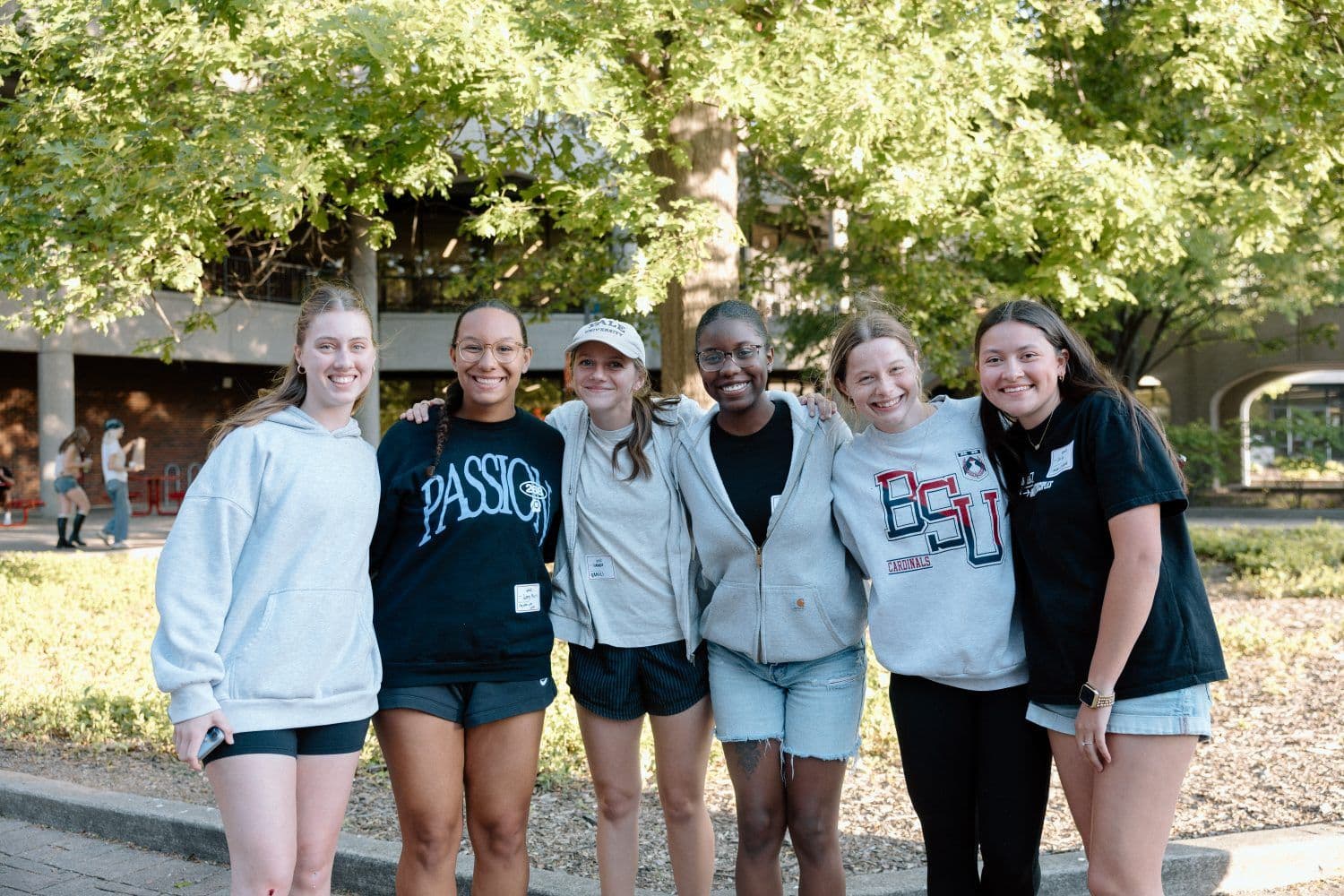 A group of students walking together on a city street